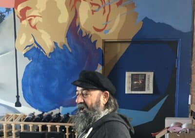 Le Chene's Juan Alonso with a Mural in his honor at Angeleno Wines