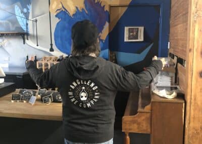 Le Chene's Juan Alonso admires a Mural painted in his honor at Angeleno Wines